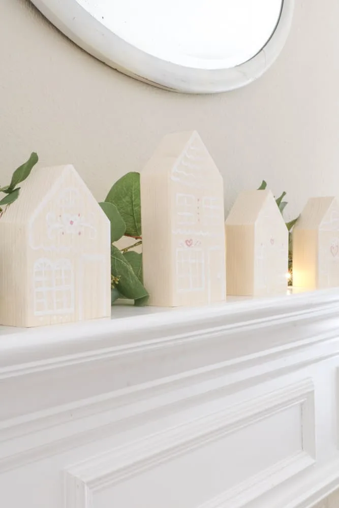 Decorate for Valentine with wooden gingerbread house on your mantle