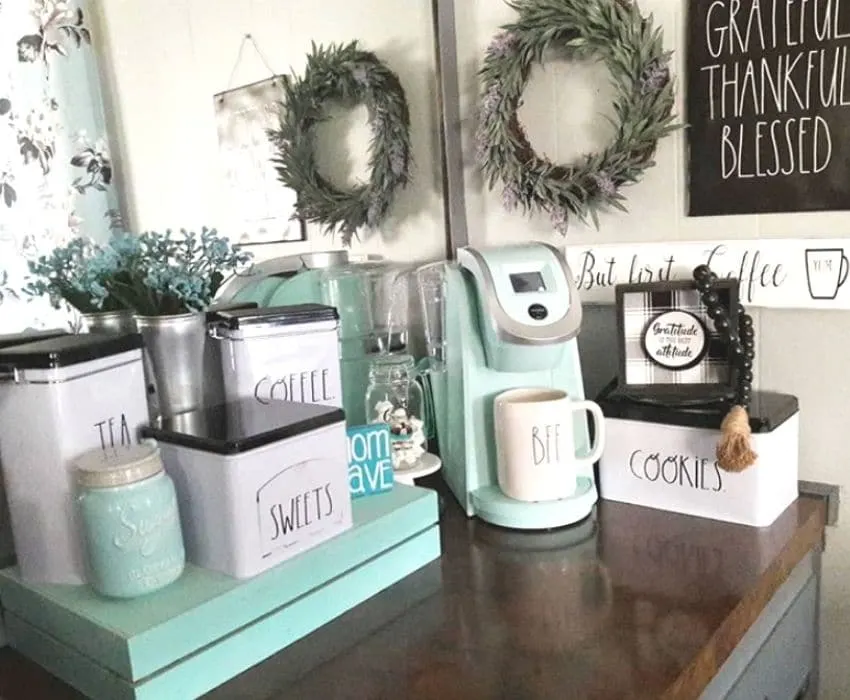 A coffee bar with Rae Dunn tin storage by Luv Shades of Blue