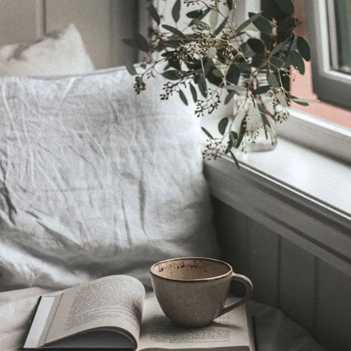 A book nook with coffee from Stefie Reads