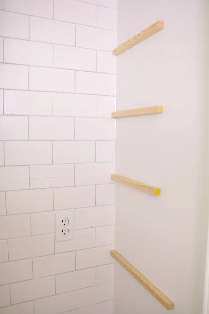 Hang dowels on the side of the microwave pantry