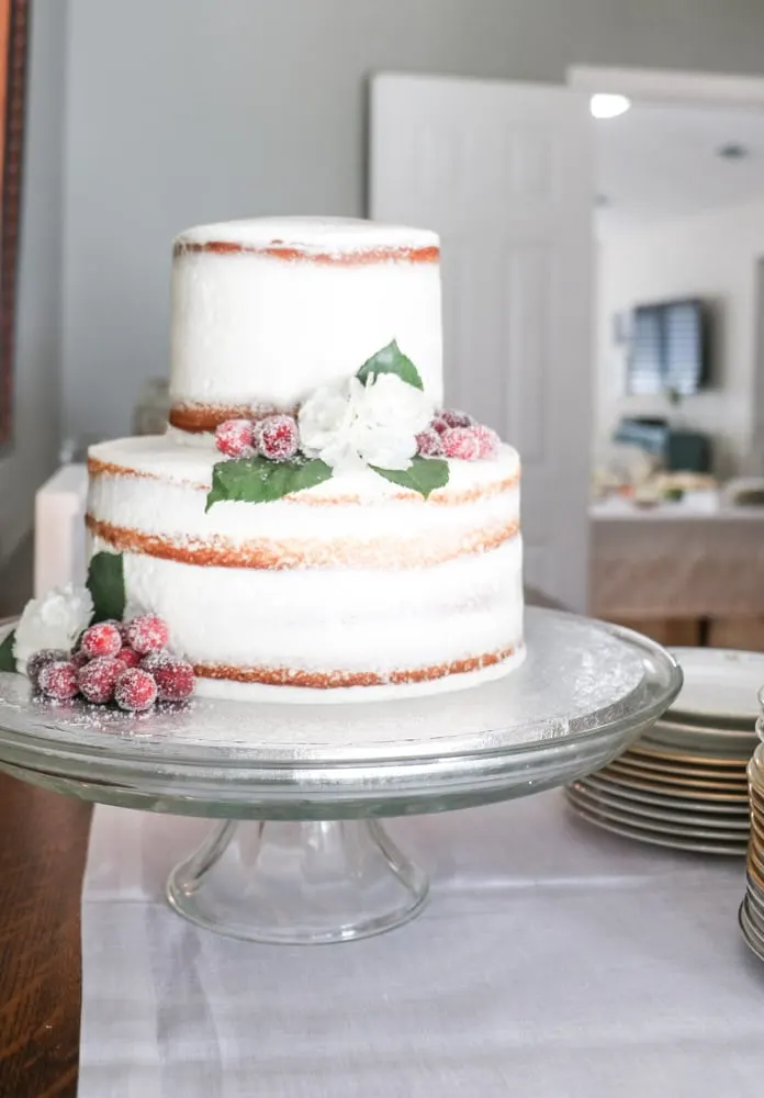 Two tiered naked cake with flowers for a southern bridal shower