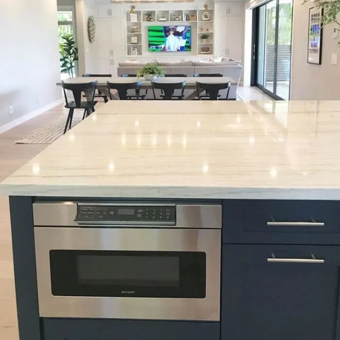 Microwave built into a kitchen island by Tim Lloyd Construction