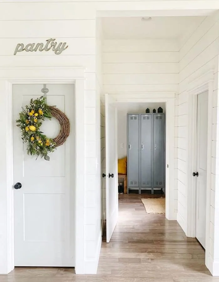 Alabaster White on a pantry & hallway by Revival Home Designs