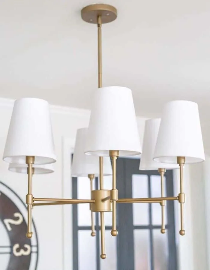 Spray painted chandelier makeover by Bless'er House