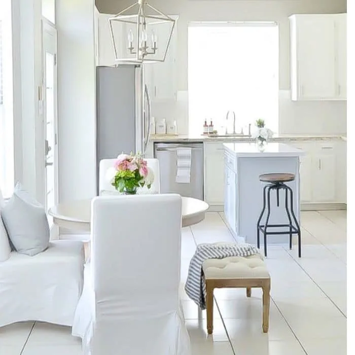 Alabaster White on cabinetry and Thundercloud Gray on an Island by Julie Warnock Interiors