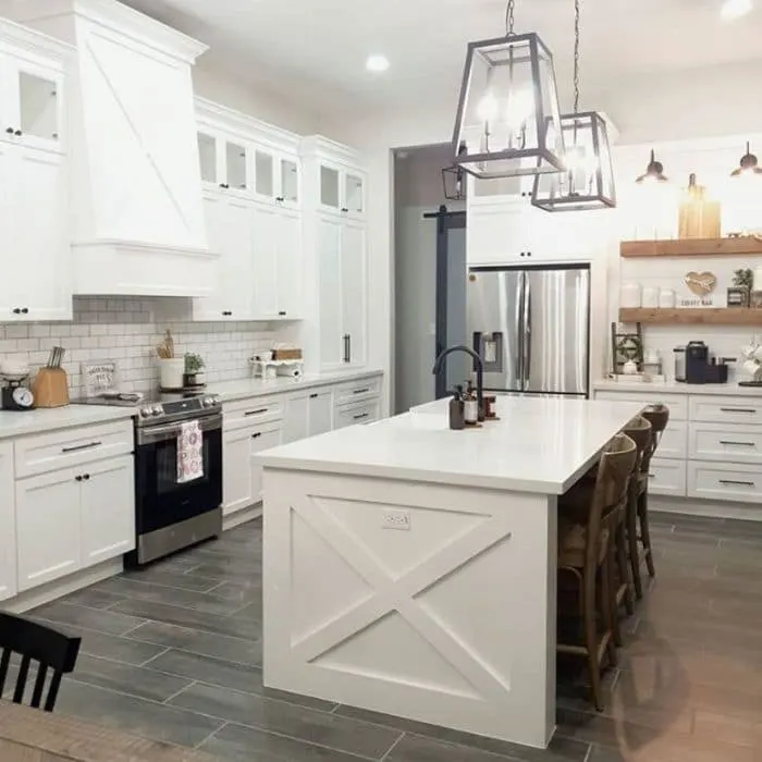 Snowbound painted kitchen cabinets & Agreeable Gray on the  walls.