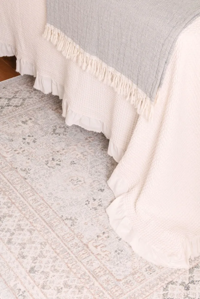 Guest bedroom muted rug
