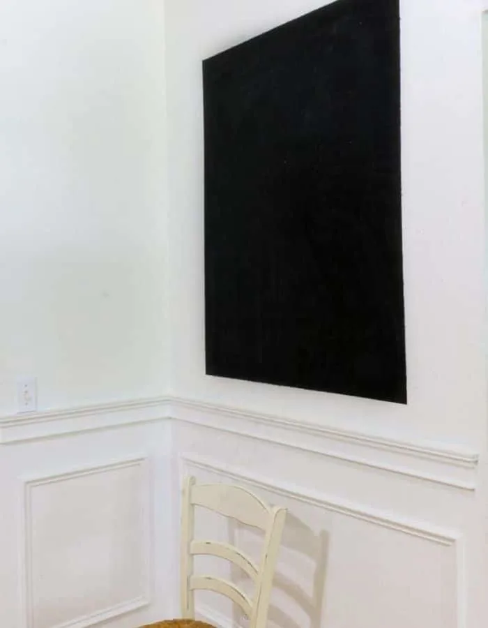 Here is the homemade chalkboard painted on the wall after the painters tape was removed.