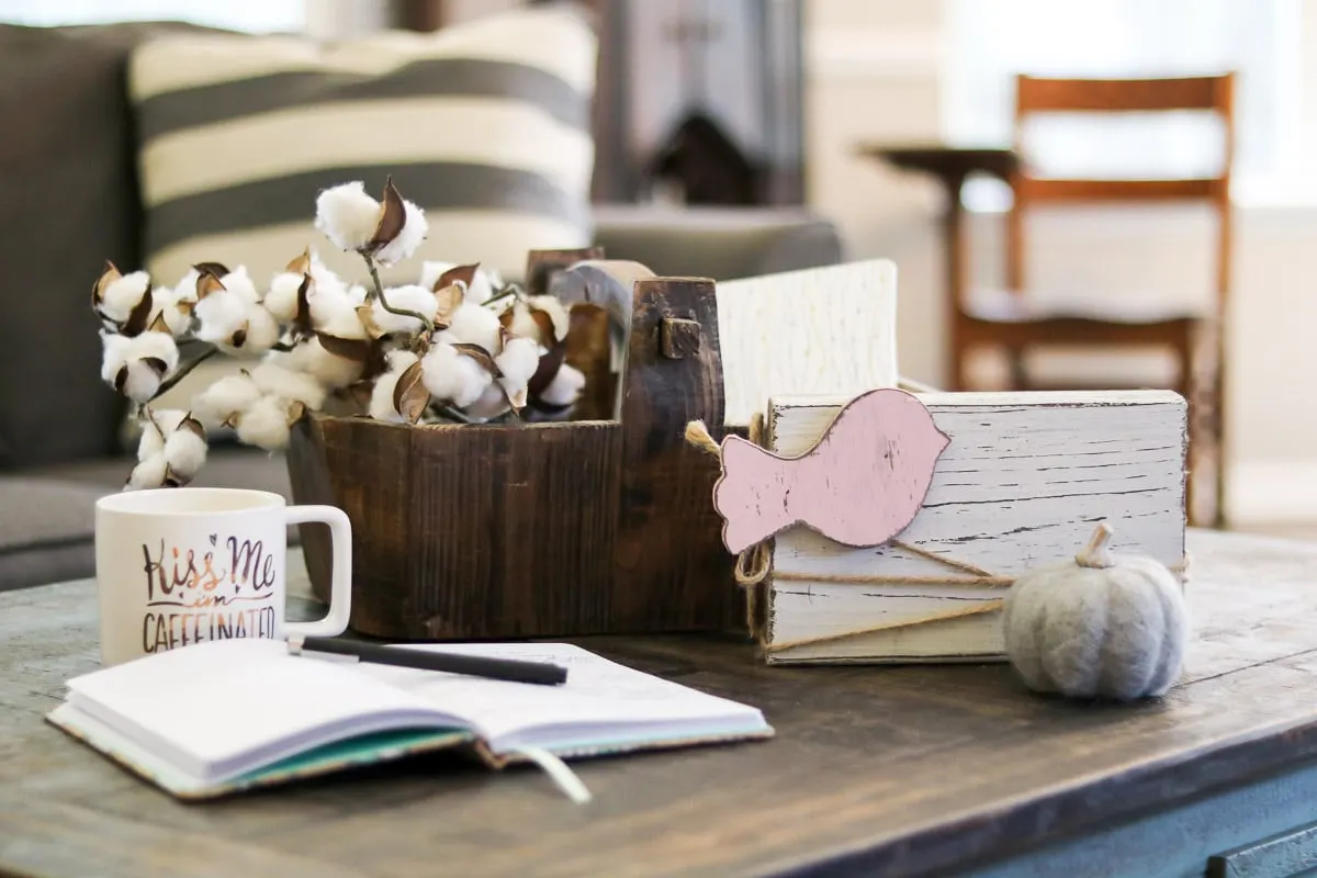 Farmhouse cotton accessories on a coffee table