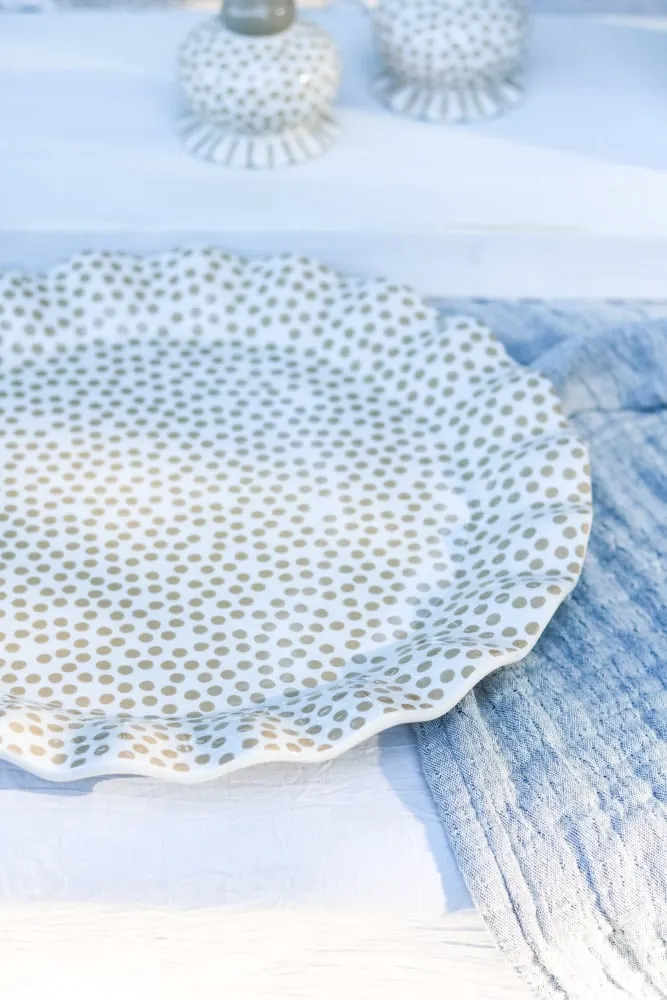 Ruffled polka dot charger for a place setting