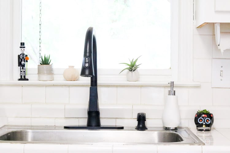 Matte black faucet for farmhouse kitchen sink