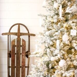 pom pom garland on a Christmas tree