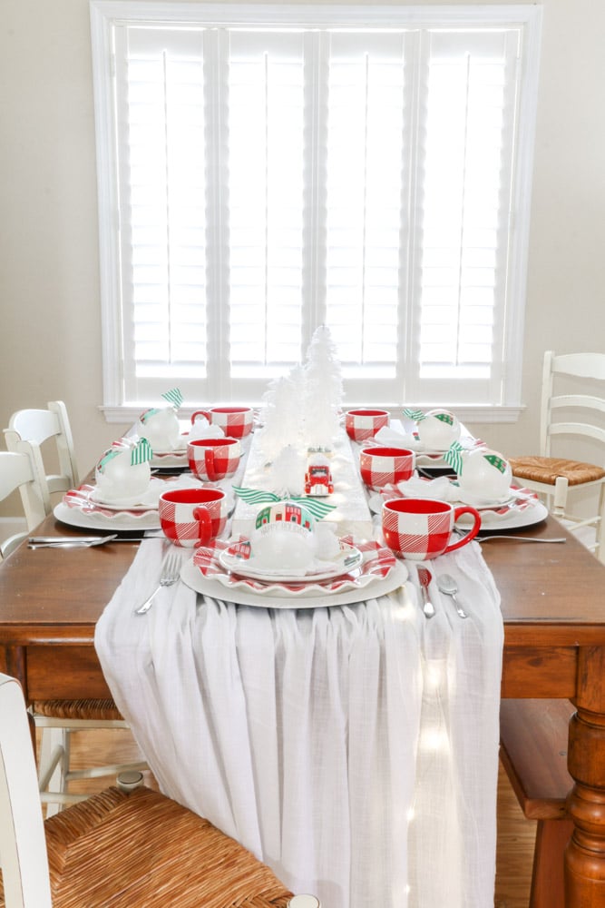 Christmas tree centerpiece and vintage village place setting