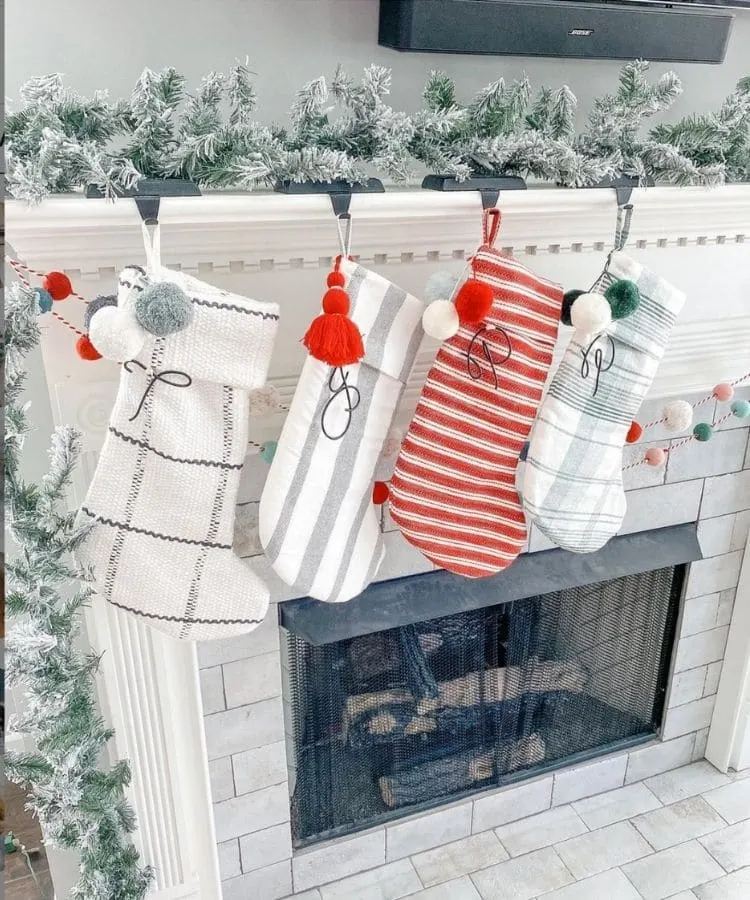 Beautiful stocking hanging on a fireplace