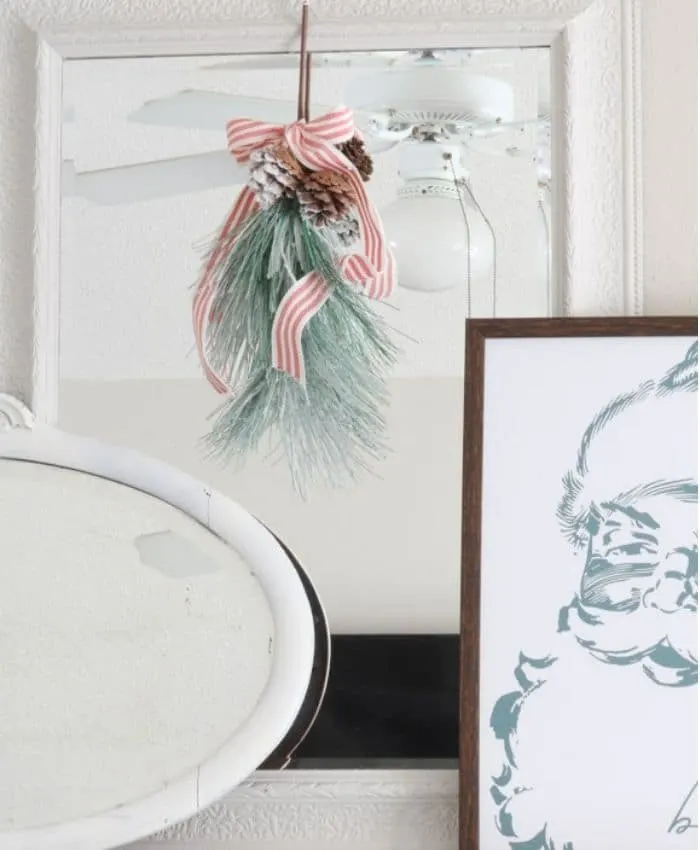 Indoor wreaths home decorating with a wreath on a mirror on a mantle