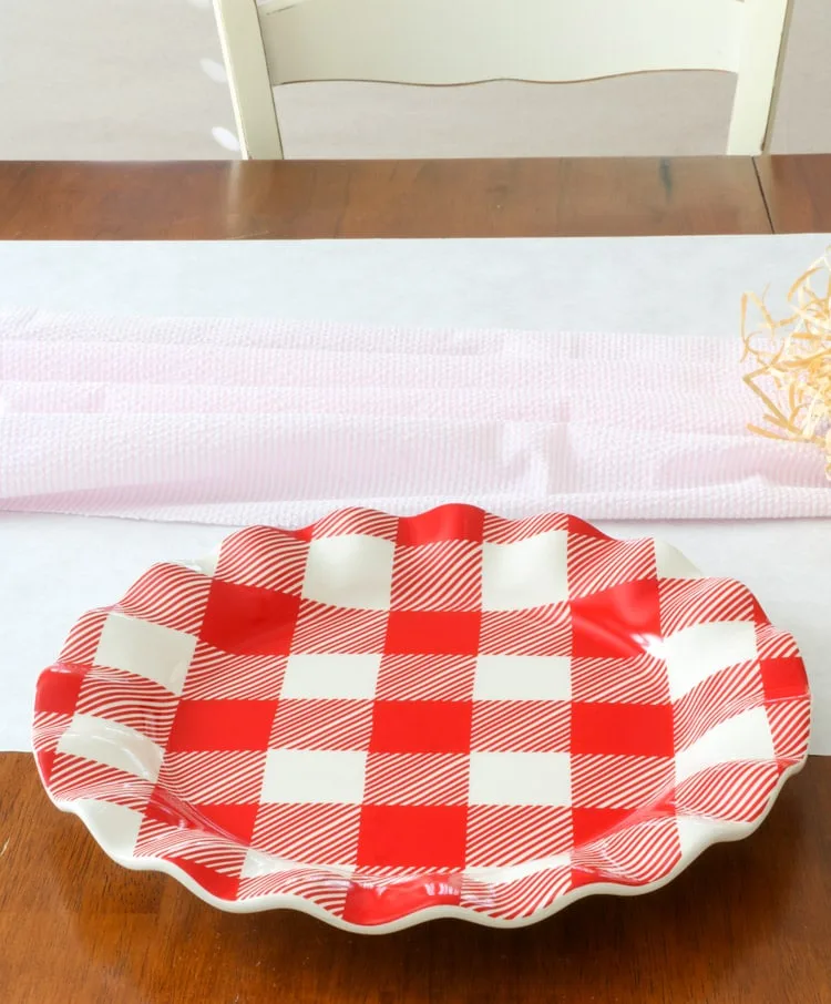 Valentine dinner place setting using buffalo check red and white ruffle plates by Coton Colors