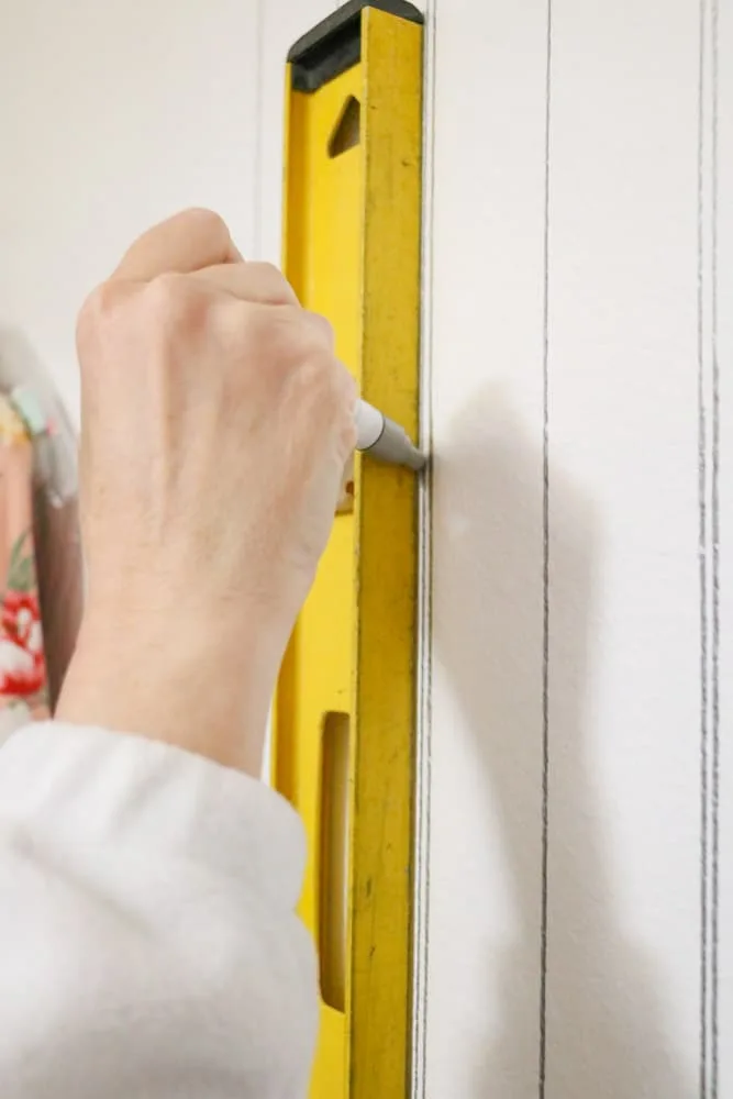 Use a paint pen to draw a fake beadboard