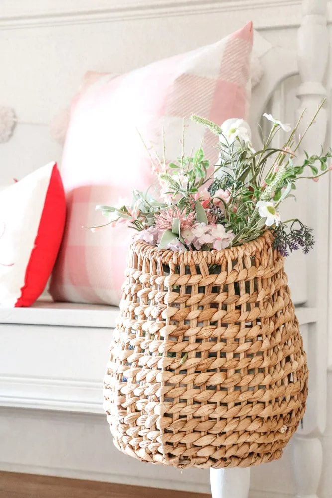 Basket of flowers as decorations on a Valentine's entryway