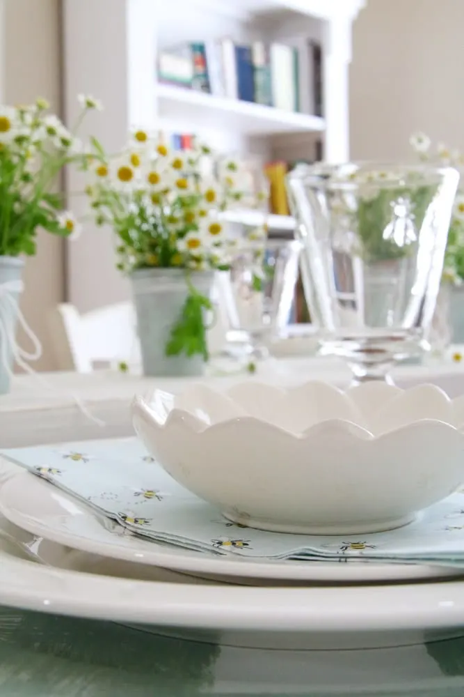 DIY dollar store spring tablescape using Pop Shelf jewelry dish on a spring place setting