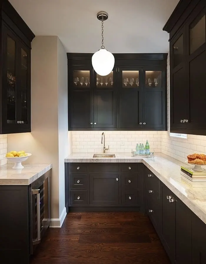 Popular Sherwin Williams black paint color for cabinets.  Iron Ore high glass cabinets.