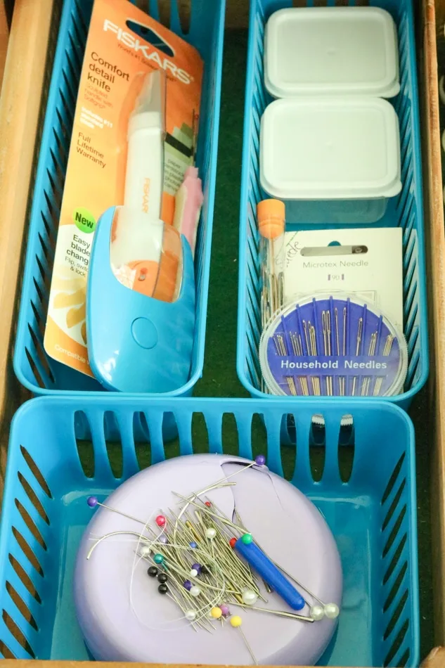 How to organize sewing supplies on a budget in a drawer with storage containers.