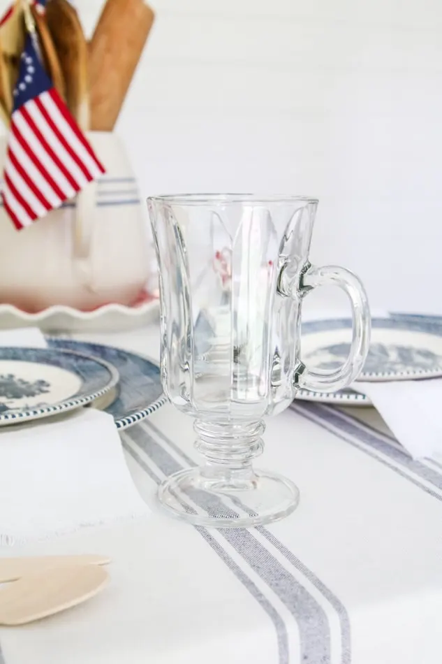 Independence day table setting with irish coffee mug glasses by Dollar Tree