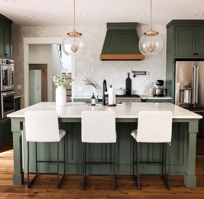 Kitchen cabinetry and island painted in a Rosemary green color by Sherwin Williams