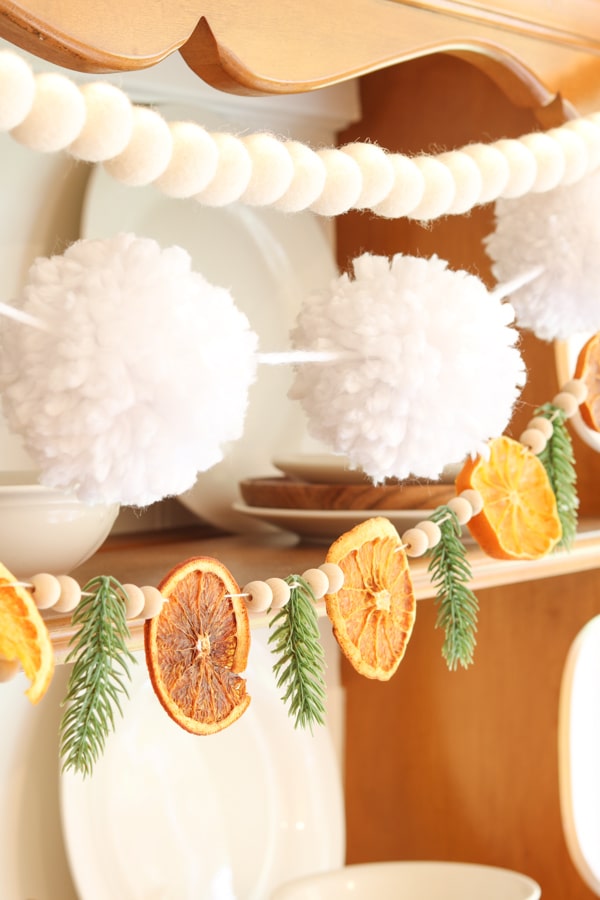 Natural homemade Christmas decor is trending 2025:  Dried orange slice garland