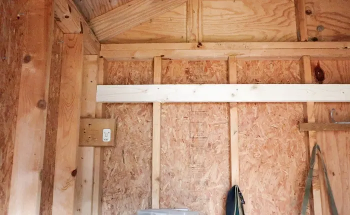 Building a shed loft step by step starting with wood on back wall