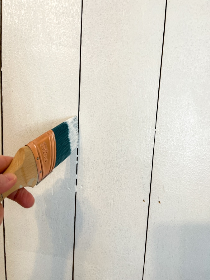 Removing paint from gaps on plywood shiplap wall