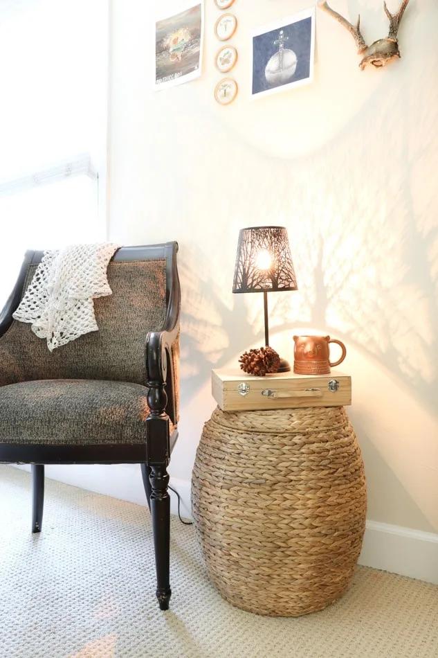 Cottagecore reading corner with wicker drum for end table