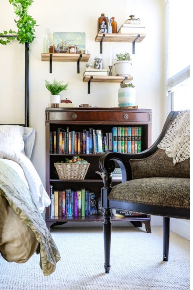Bookcase filled with books for a teenagers cottagecore bedroom