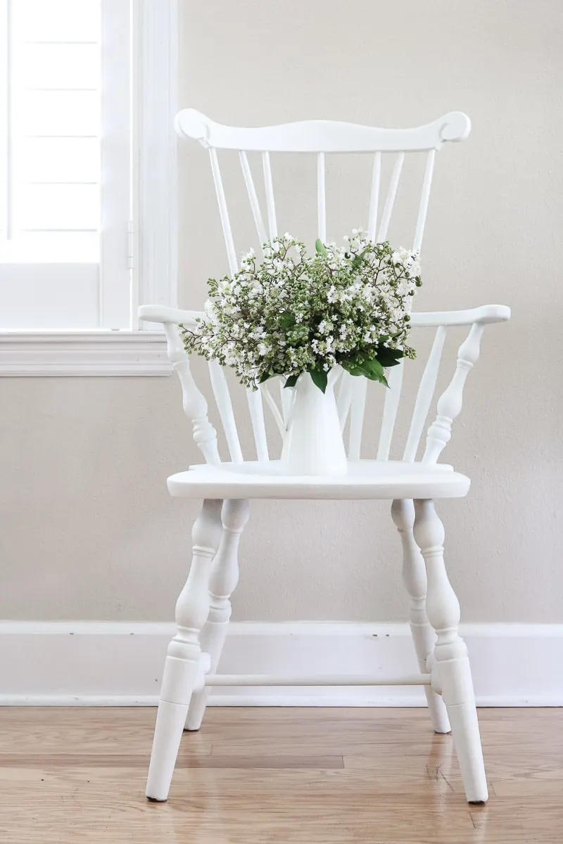 Windsor chair thrifted and painted white with milk paint