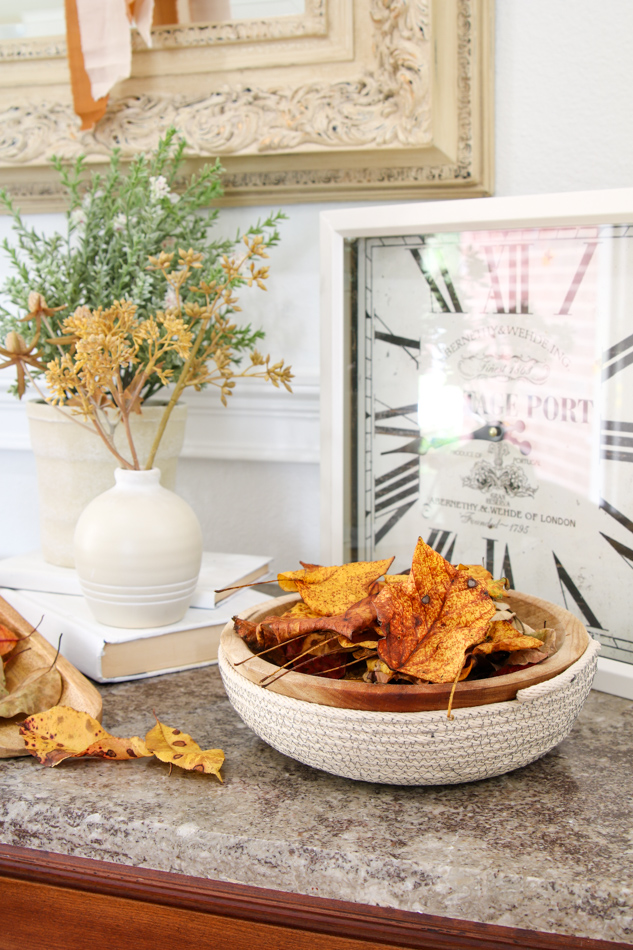 Decorating baskets with fall leaves