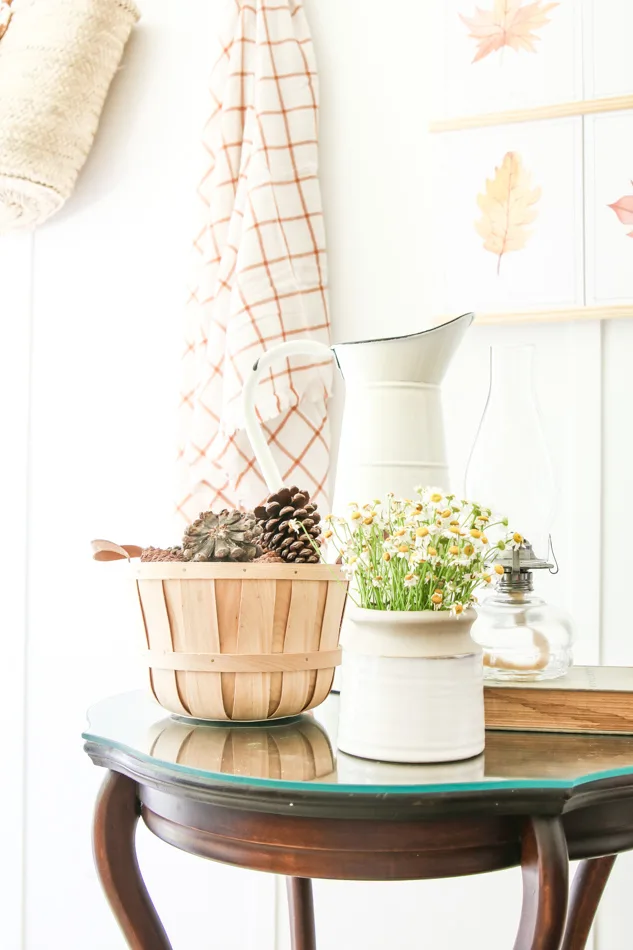Decorating for fall with pinecones and baskets