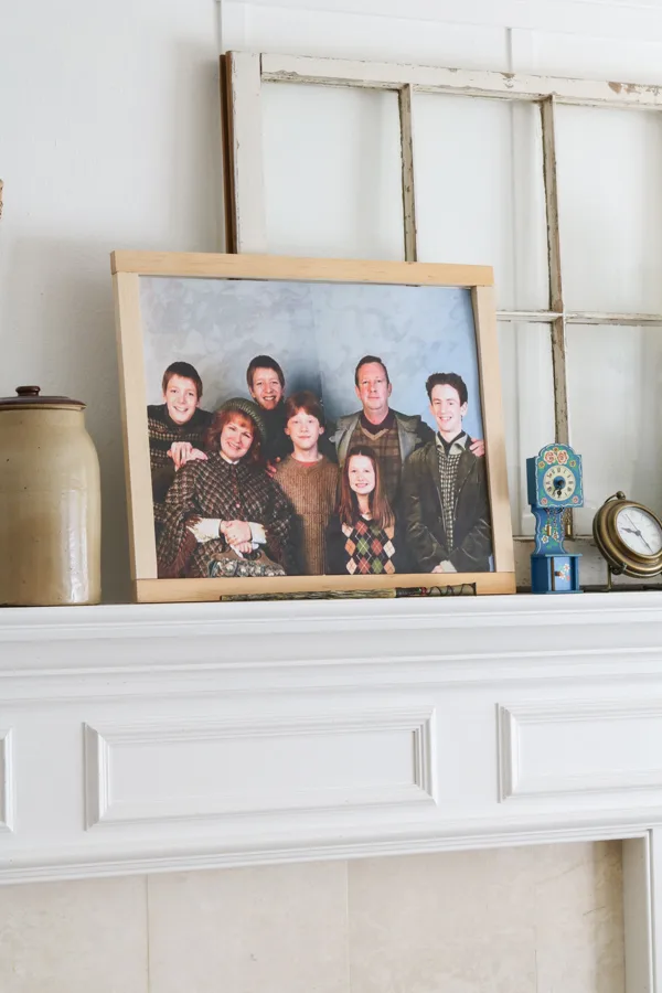 Weasley family portrait from Harry Potter movie sitting on a mantel