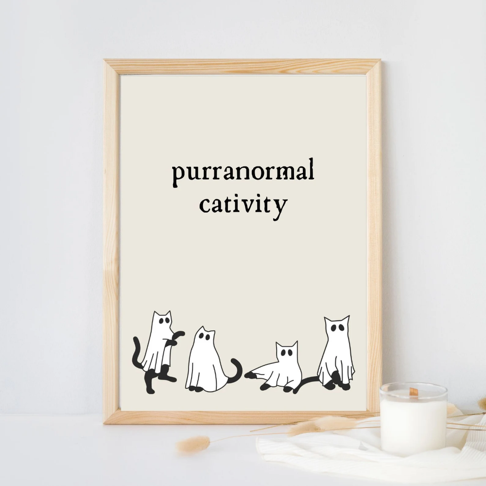 Cat lovers Halloween printable sign that says "purranormal cativity."