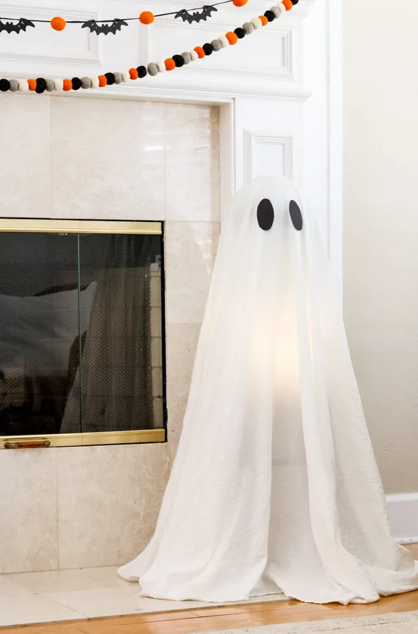 Homemade light up ghost DIY that looks like a vintage child costume