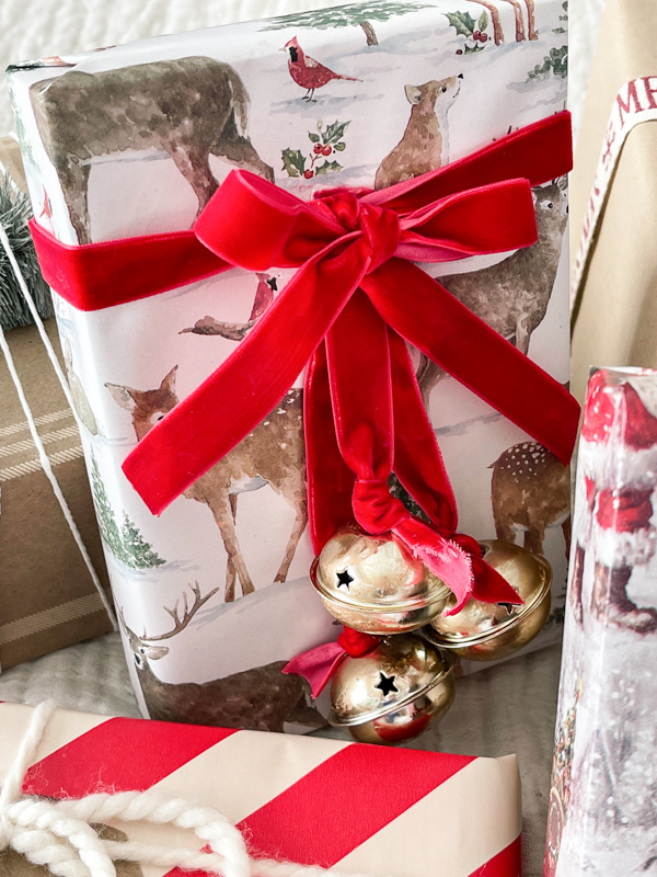 Decorating Christmas presents with ribbon bows