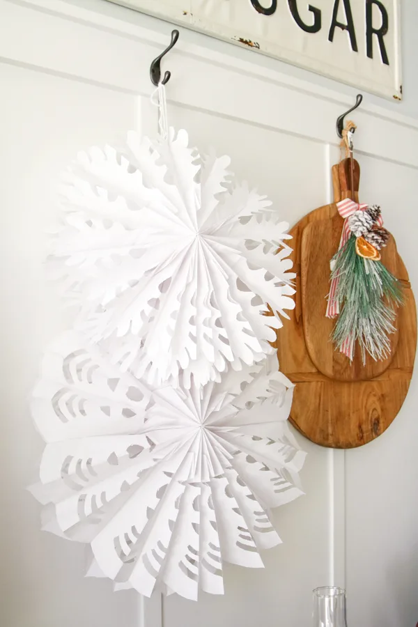 Paper crafts like these snowflakes made from bags is a popular Christmas trend.