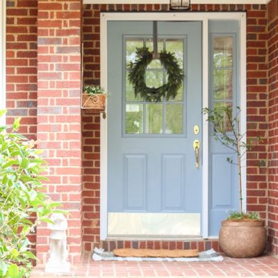 Decorating a front porch for spring in a vintage aesthetic