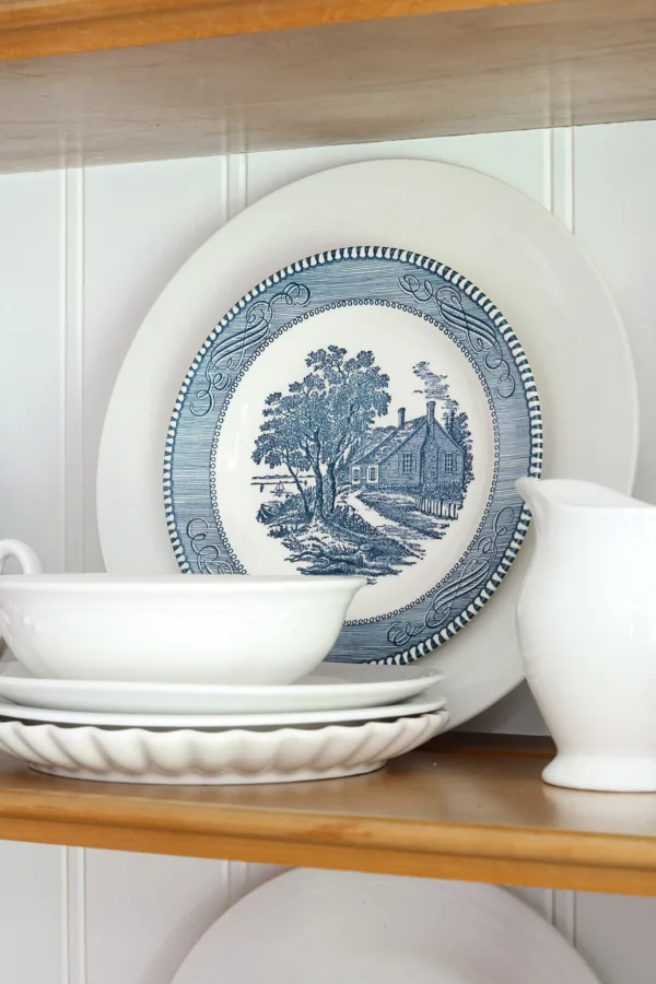 Vintage Currier and Ives dishes used for 4th of July decorating.