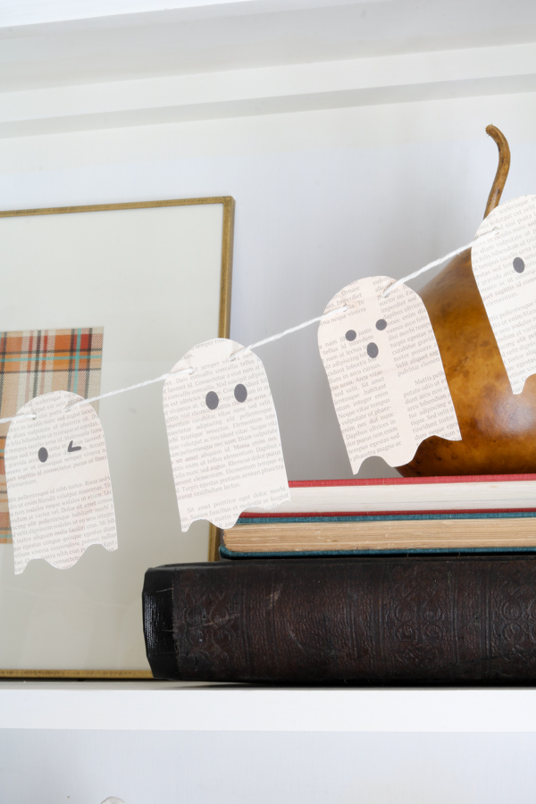 Halloween decorations using paper of a book page ghost and made into a garland