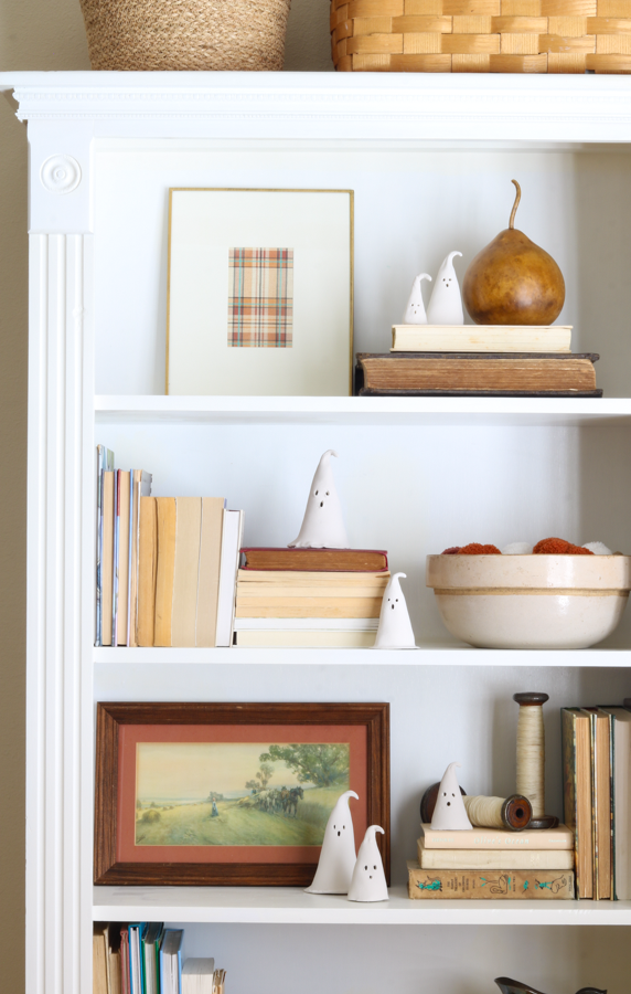 Decorating with clay ghosts on bookcases
