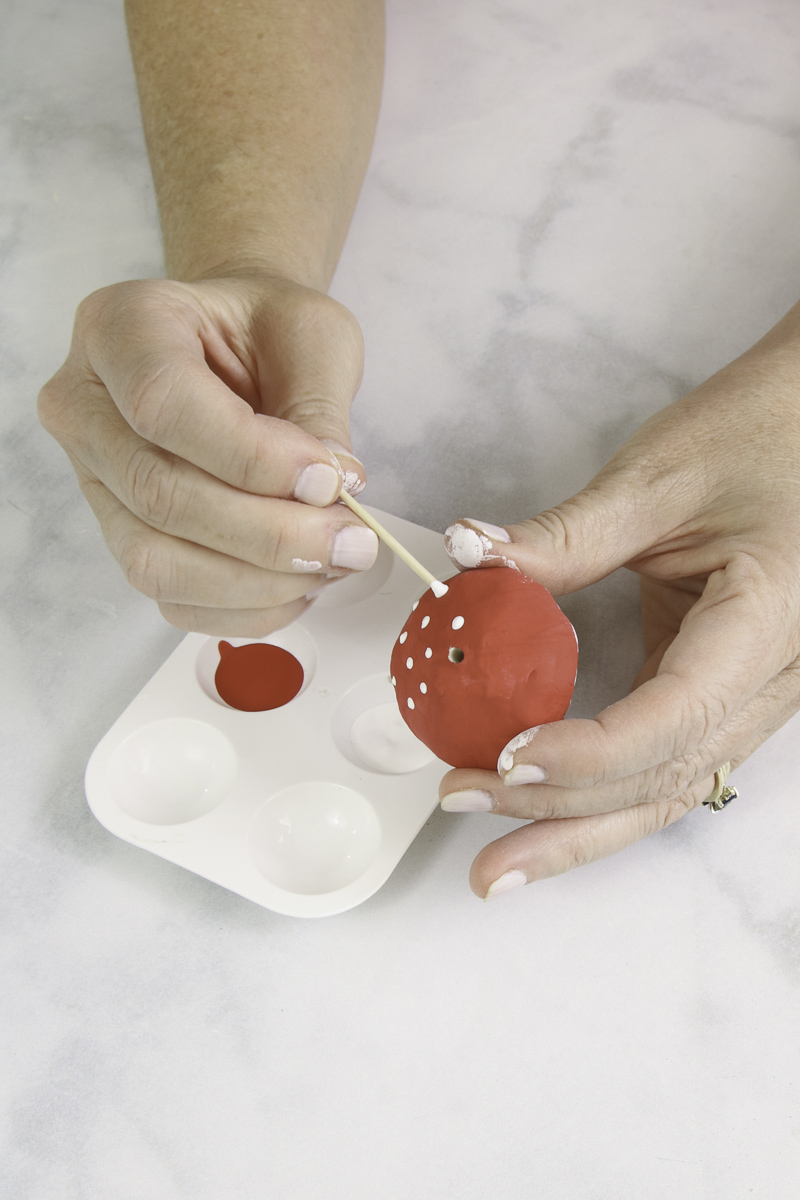 DIY clay mushroom with red and white dots