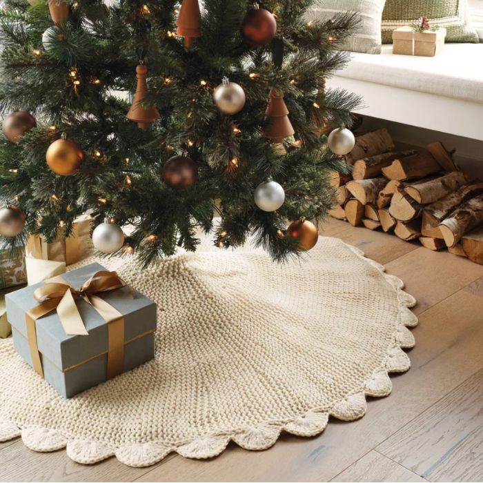 Studio McGee Christmas tree skirt.  Sweater material with scalloped edge in neutral color,