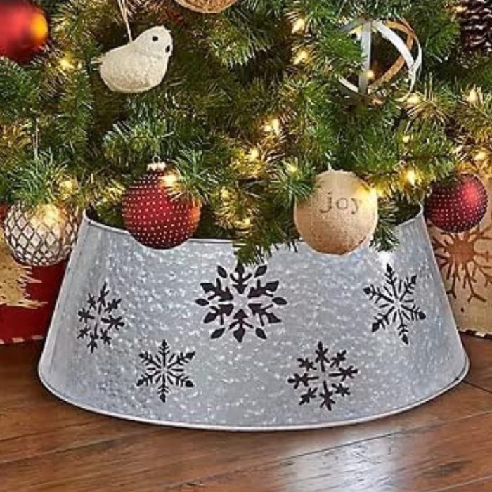 Galvanized metal Christmas tree base.  This tree color has snowflakes cut out of the design.  Perfect for a winter wonderland theme or farmhouse Christmas decor.