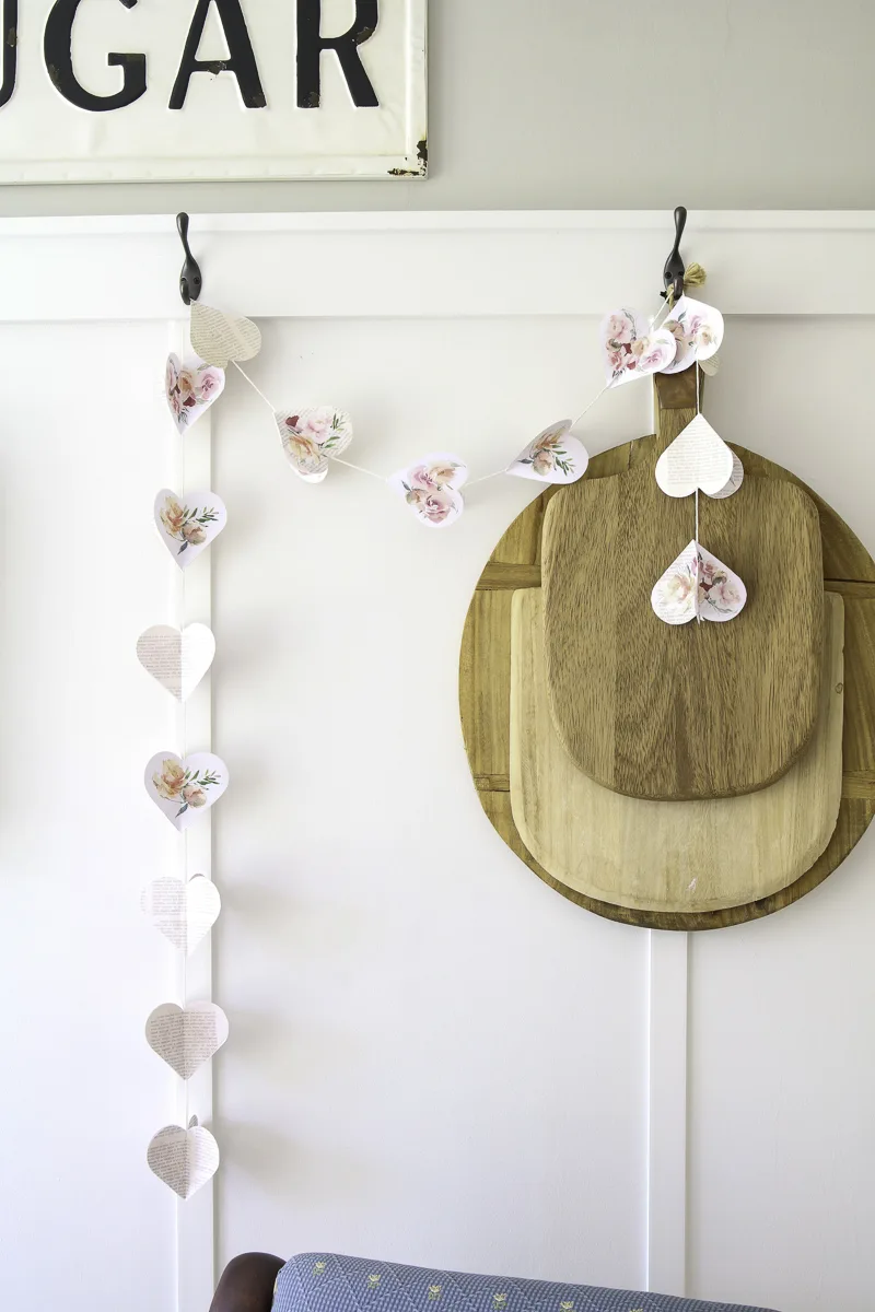 Bookpage heart garland with watercolor flowers