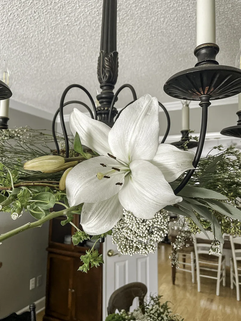 Chandelier flower arrangement for an enchanted garden bridal shower