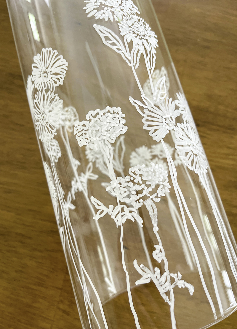 Birth month flowers painted on a glass cylinder for a candle holder diy